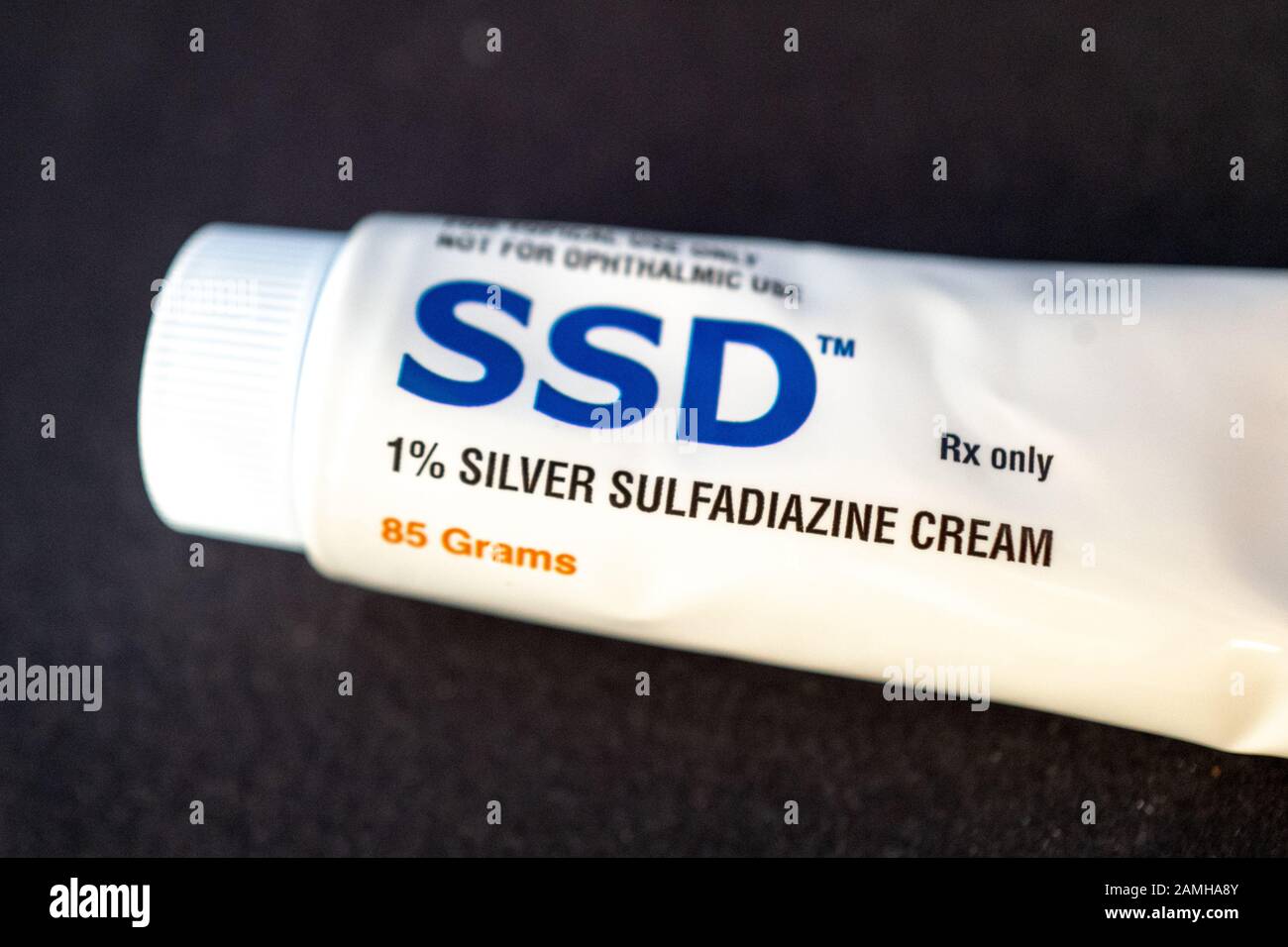 Close-up of silver sulfadiazine cream against a black background, often  used in the treatment of burns, November 29, 2019 Stock Photo - Alamy
