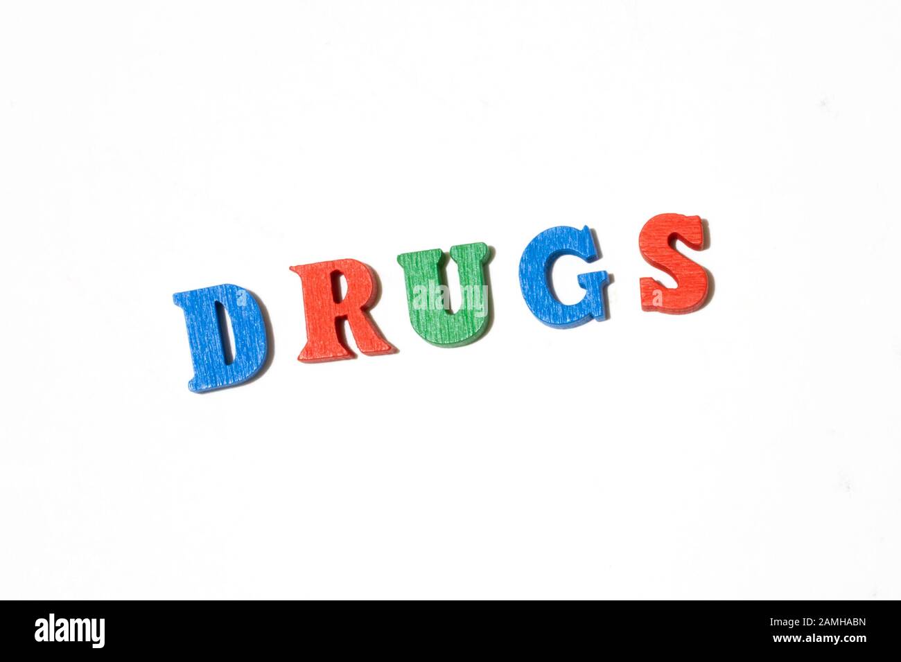 Word drugs made with letters of different color on white background Stock Photo