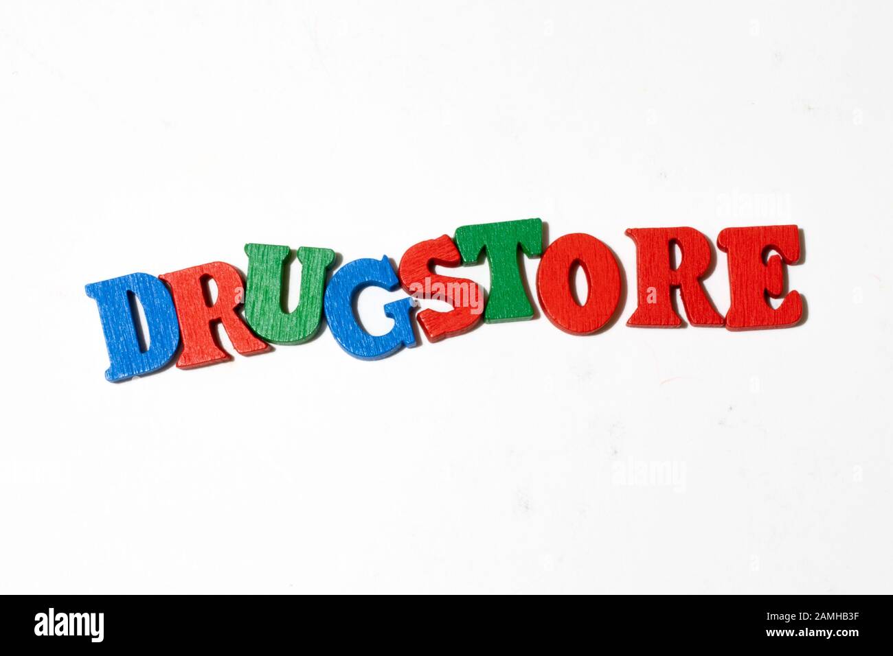 Word drugstore made with letter board on white background Stock Photo