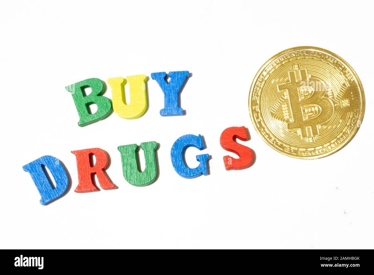 Buy drugs made with letters of different color on white background top view. Buying drugs for bitcoin and cryptocurrency concept Stock Photo