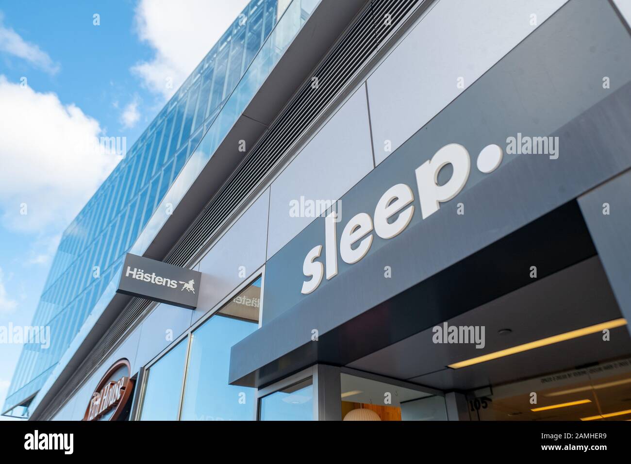 Logo and text reading Sleep on facade of Hastens European mattress