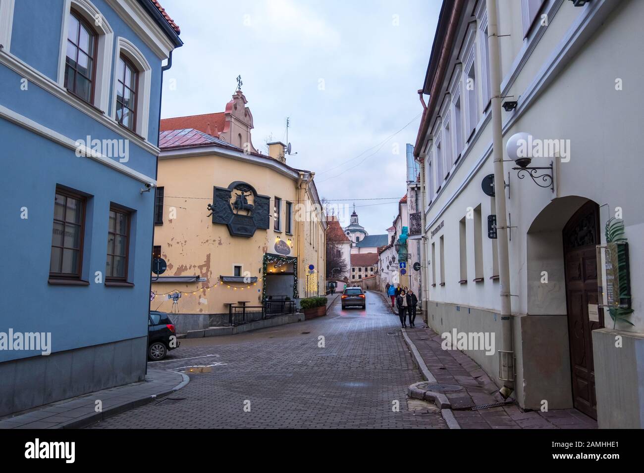 Vilnius, Lithuania - December 15, 2019: View of ancient street in Old city center in Vilnius, Lithuania Stock Photo