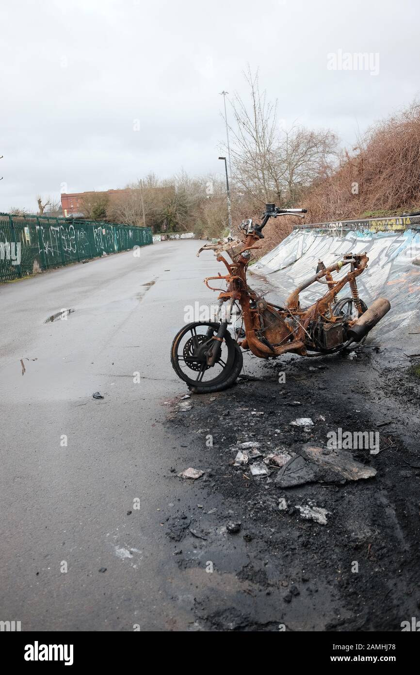 January 2020 - Burnt out scooter in Bristol on a cycleway Stock Photo ...