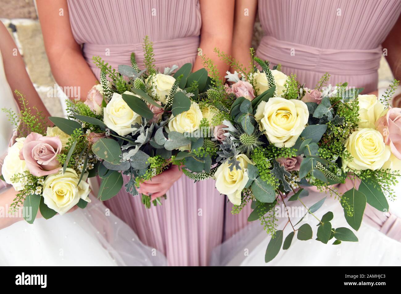 Bridal and bridesmaids bouquets at a wedding Stock Photo
