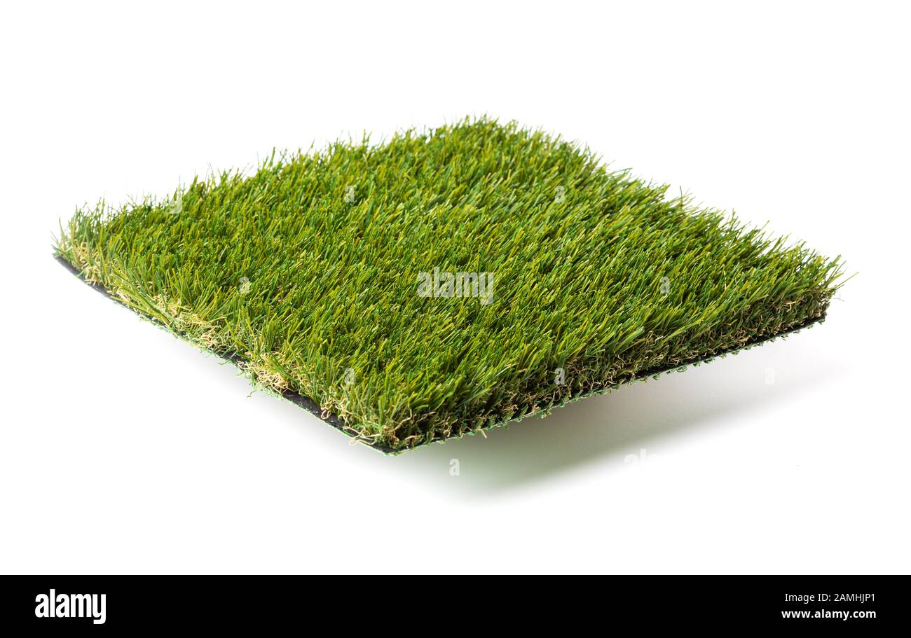 Section of Artificial Turf Grass Isolated On White Background. Stock Photo