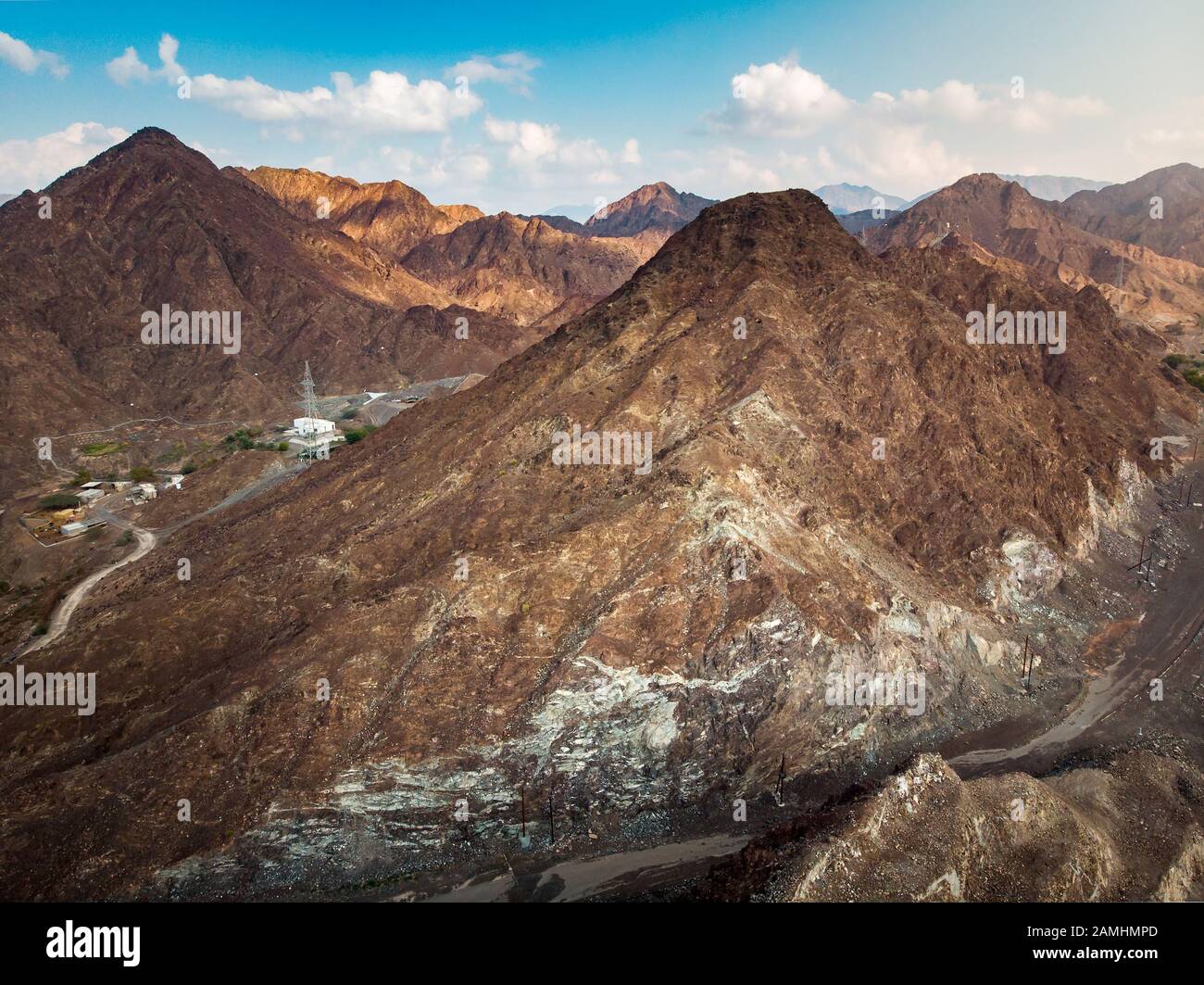 Scenic Hajar mountain range stretching through UAE and Oman aerial view Stock Photo