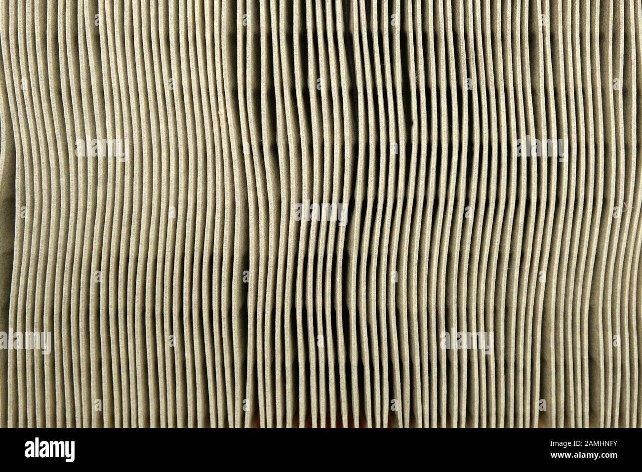 abstract background with surface and structure of the car intake air filter, texture of fiber material of conditioning system element Stock Photo