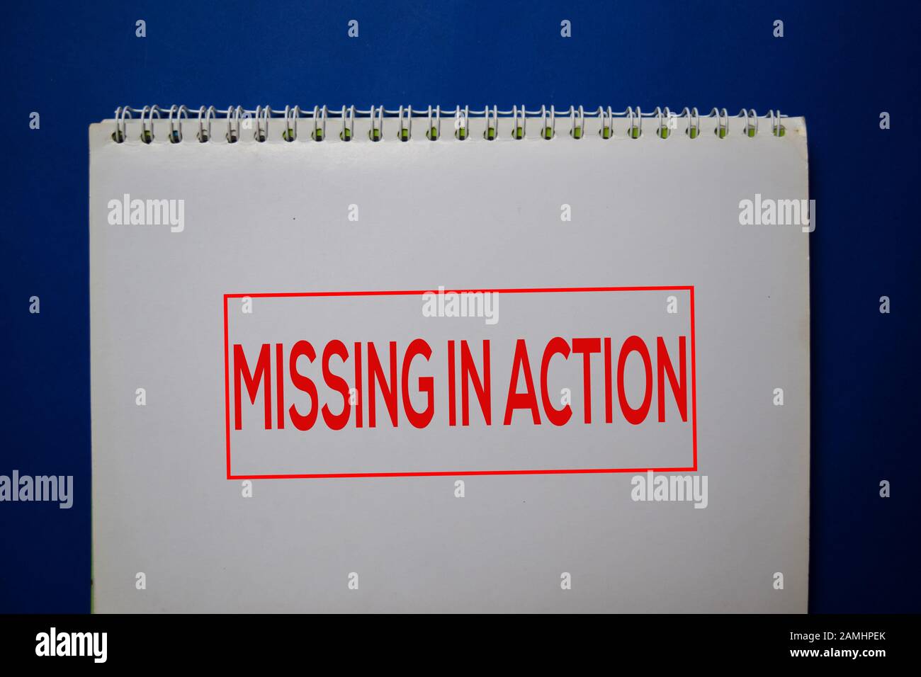 Missing Action write on a book isolated on blue background Stock