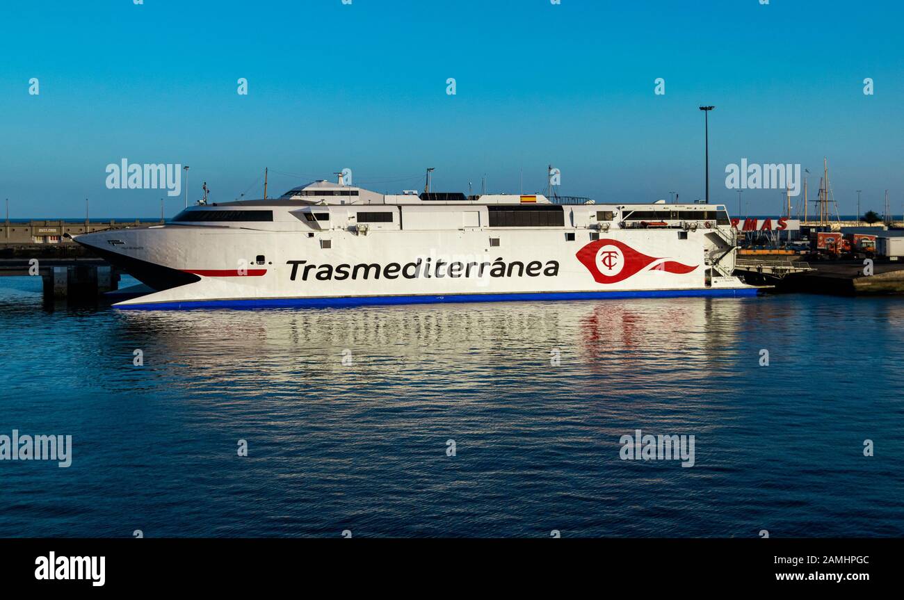 Huge Trasmediterranea passenger and cargo ferry boat docked in the Santa Cruz de Tenerife port. Stock Photo