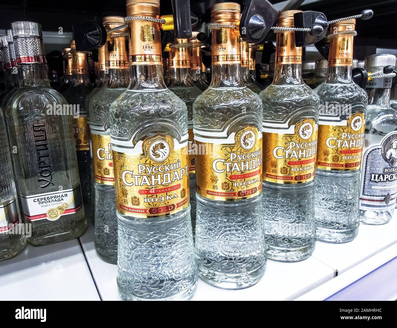 Samara, Russia - January 12, 2020: Russian vodka ready for sale on the shelf in superstore. Various bottled alcoholic beverages Stock Photo