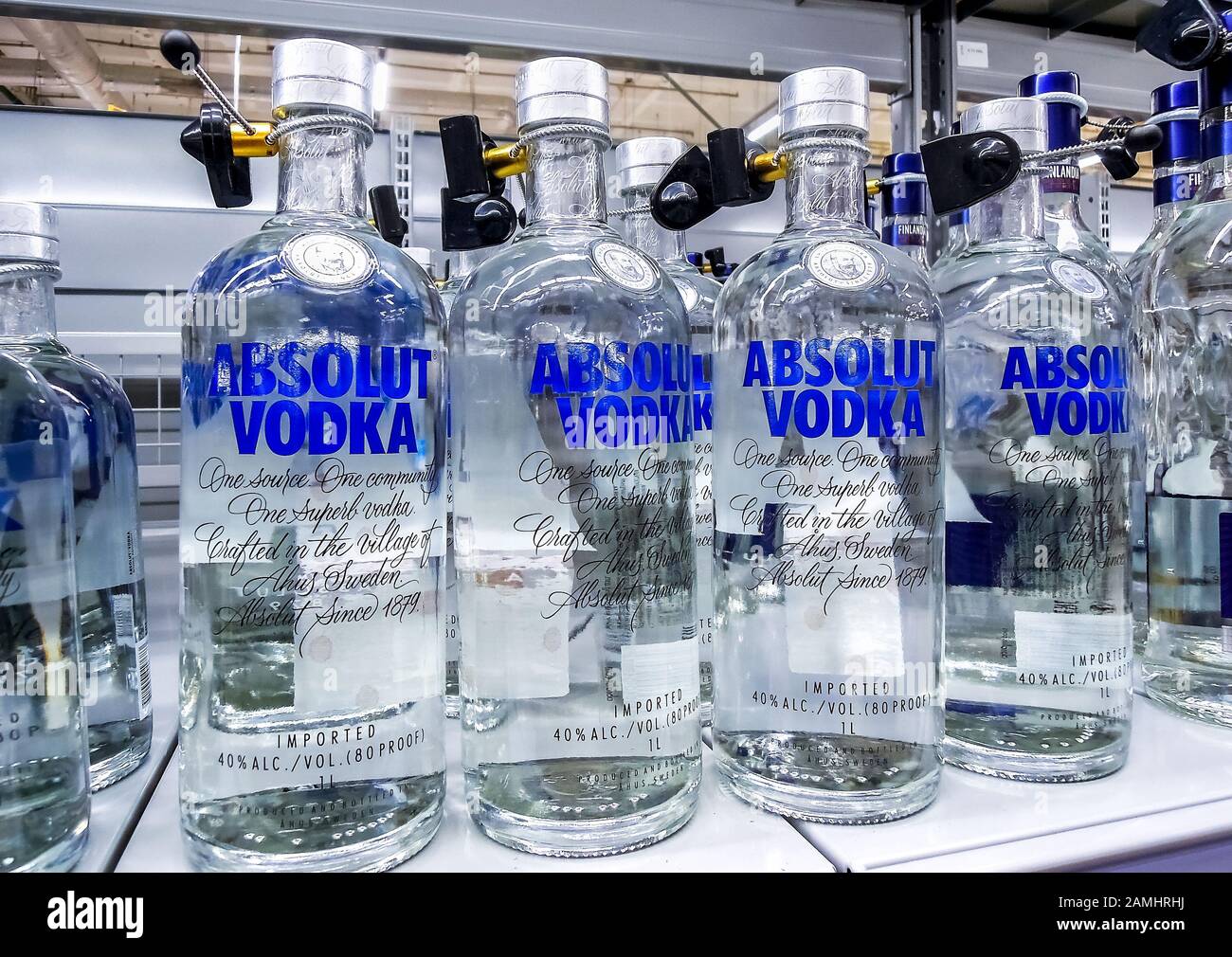 Samara, Russia - January 12, 2020: Absolut Vodka ready for sale on the shelf in superstore. Swedish brand of vodka is popular in Russia and all over t Stock Photo
