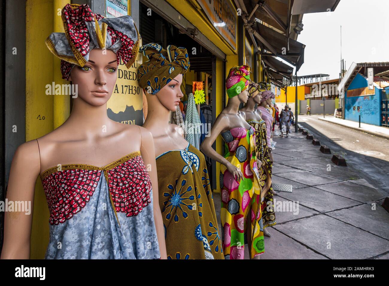 Colourful dressed mannequins outside a boutique in Pointe-a-Pitre, Guadeloupe, West Indies, Caribbean Stock Photo