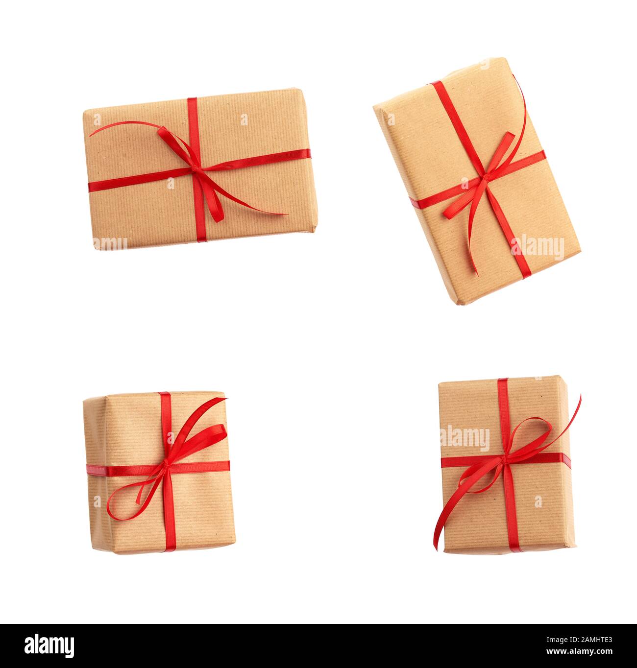 rectangular box wrapped in brown paper and tied with a red bow, gift ...