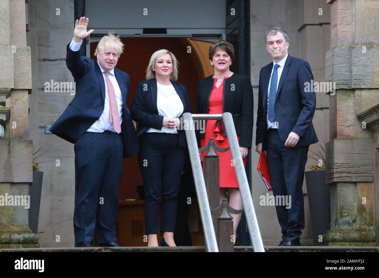 Belfast, UK. 13th Jan, 2020. British Prime Minister Boris Johnson (1st L) and British Secretary of State for Northern Ireland Julian Smith (1st R) are greeted by Northern Ireland First Minister Arlene Foster (2nd R) of the Democratic Unionist Party (DUP) and Deputy First Minister Michelle O'Neill of Sinn Fein in Belfast, Northern Ireland, the United Kingdom, on Jan. 13, 2020. Boris Johnson said Monday during a visit to Belfast, Northern Ireland that he hopes and is 'confident' to secure a zero-tariff, zero-quota agreement with the European Union (EU). Credit: Xinhua/Alamy Live News Stock Photo