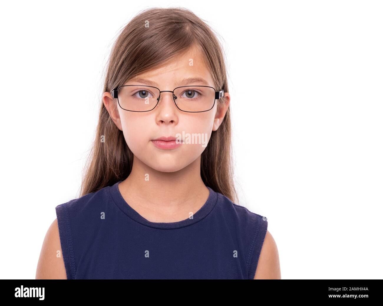 Portrait of a little girl with glasses isolated on white backgroud. Stock Photo