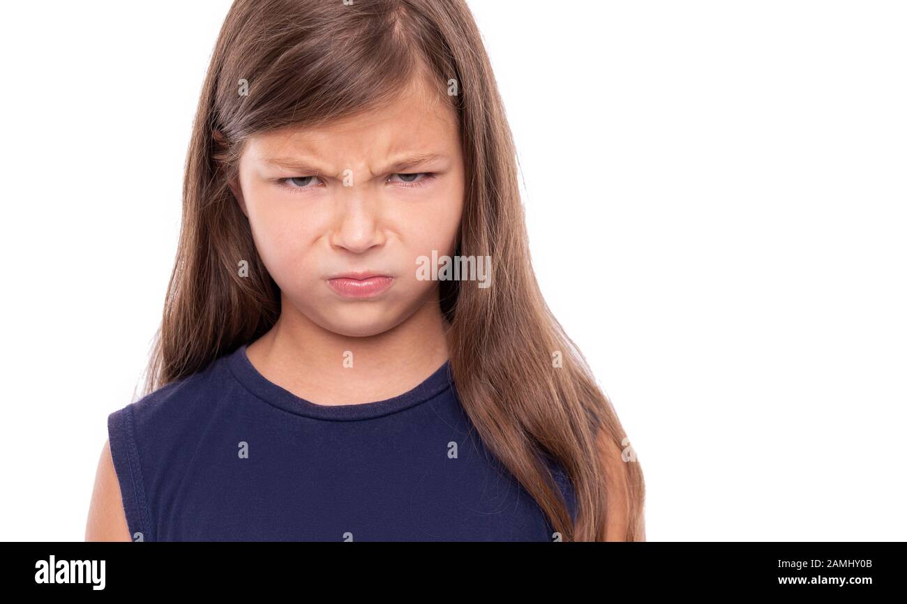 Angry baby girl on white background. Stock Photo