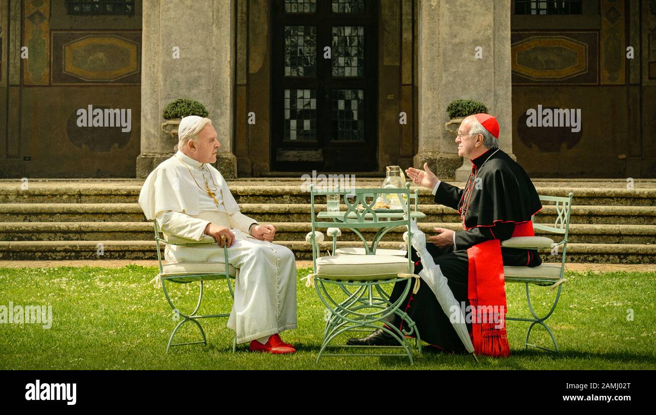 The Two Popes (2019) directed by Fernando Meirelles and starring Anthony Hopkins as Pope Benedict and Jonathan Pryce as Cardinal Jorge Bergoglio (later Pope Francis). Stock Photo