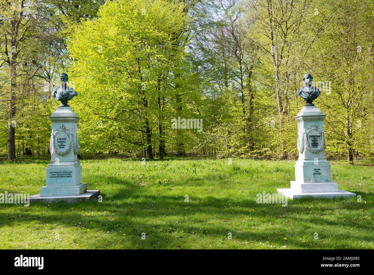 Statue of Louise queen of Denmark and Christian IX king of Denmark at Fredensborg Palace park Stock Photo