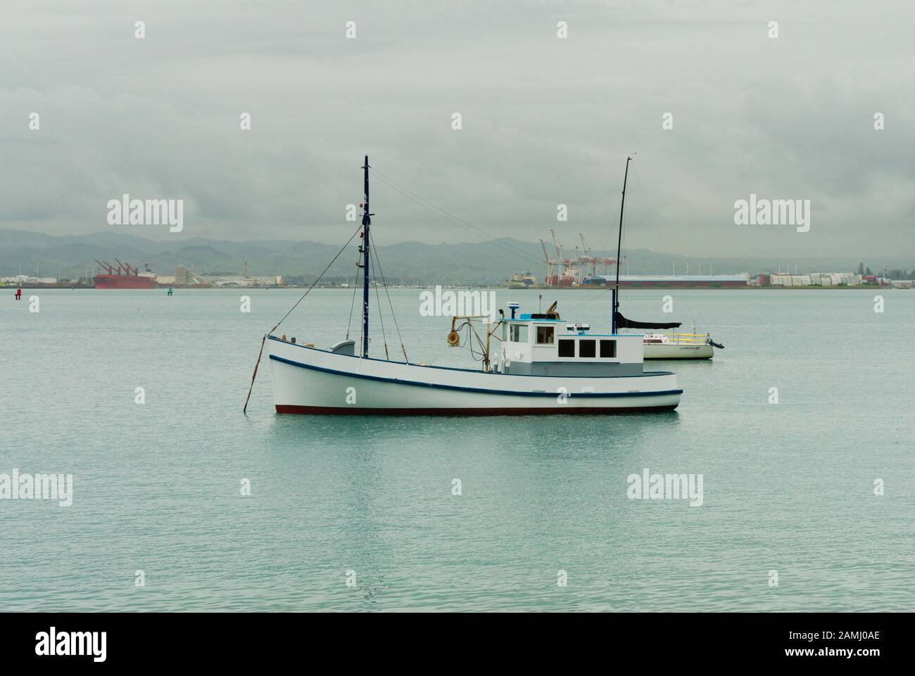 Boat anchored in the Bay of Plenty, North Island, New Zealand Stock ...