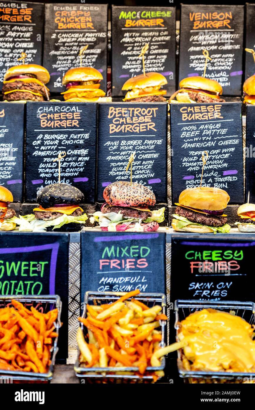 Display of burger selection at the Burgers & Fries stall in Christmas by the River market at London Bridge, London, UK Stock Photo