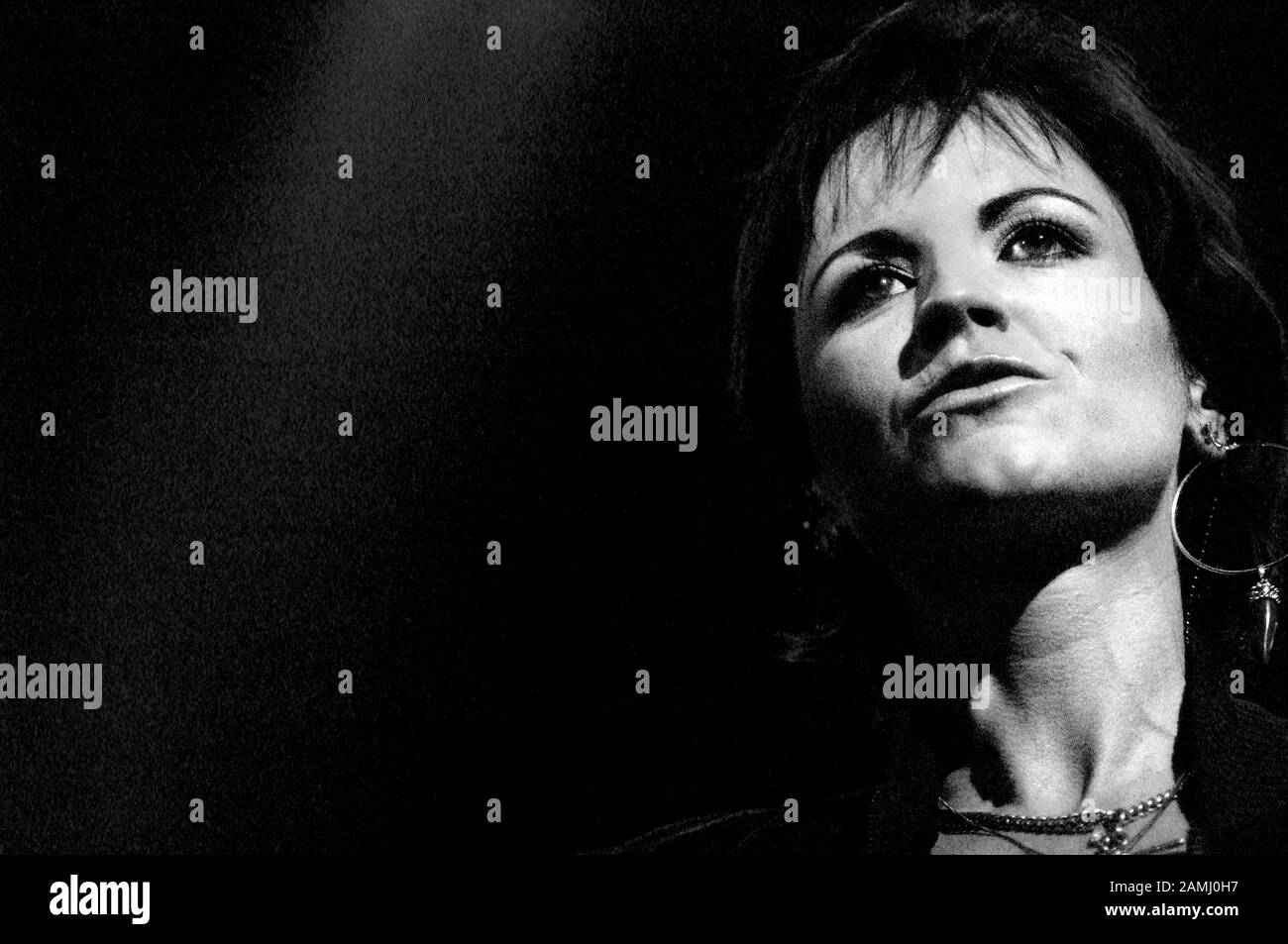 Milan Italy,  16/11/2002 ,  live concert of The Cranberries at the Forum Assago: The singer  Dolores O'Riordan during the concert Stock Photo