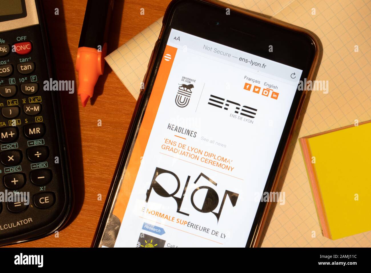 Saint-Petersburg, Russia - 10 January 2020: Phone screen with Ecole Normale Superieure de Lyon website page. Higher education admission concept Stock Photo