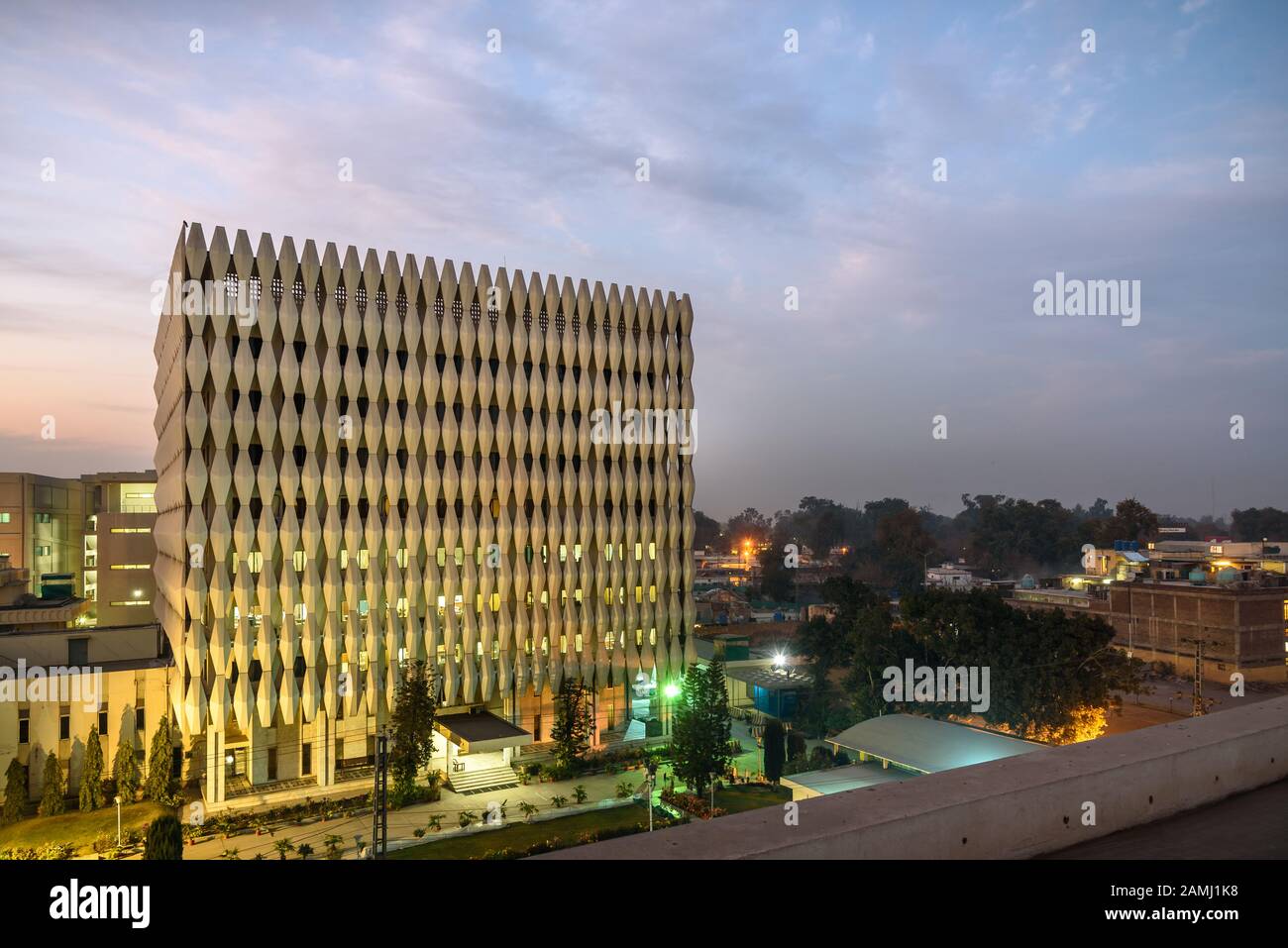 Tall building with facade look in Peshawar, Pakistan Stock Photo - Alamy