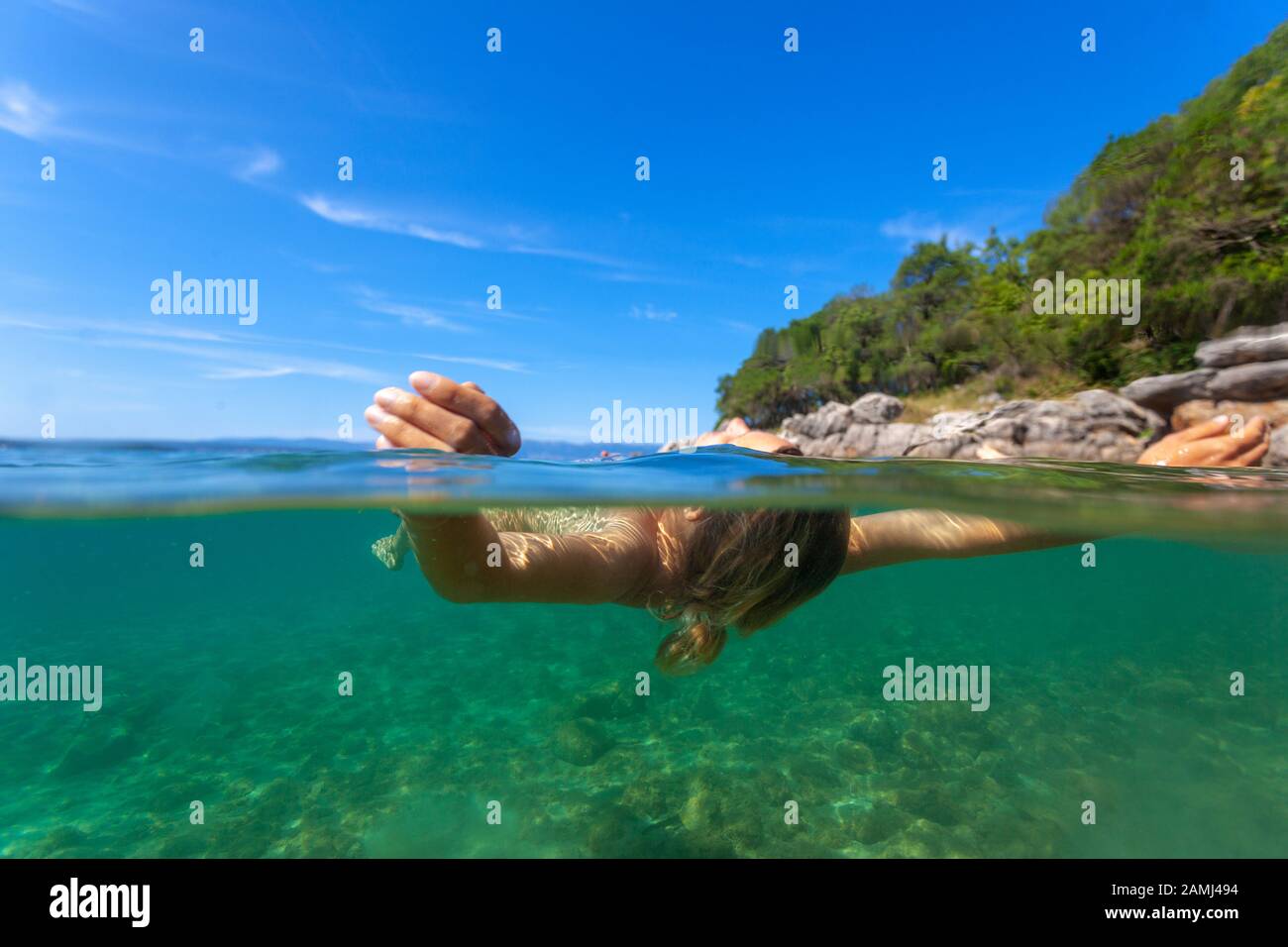 Skinny dipping in the Adriatic Sea, Croatia Stock Photo - Alamy
