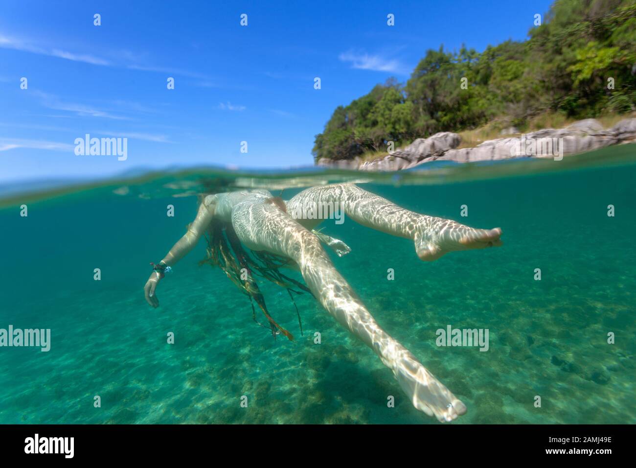 Skinny dipping in the Adriatic Sea, Croatia Stock Photo - Alamy