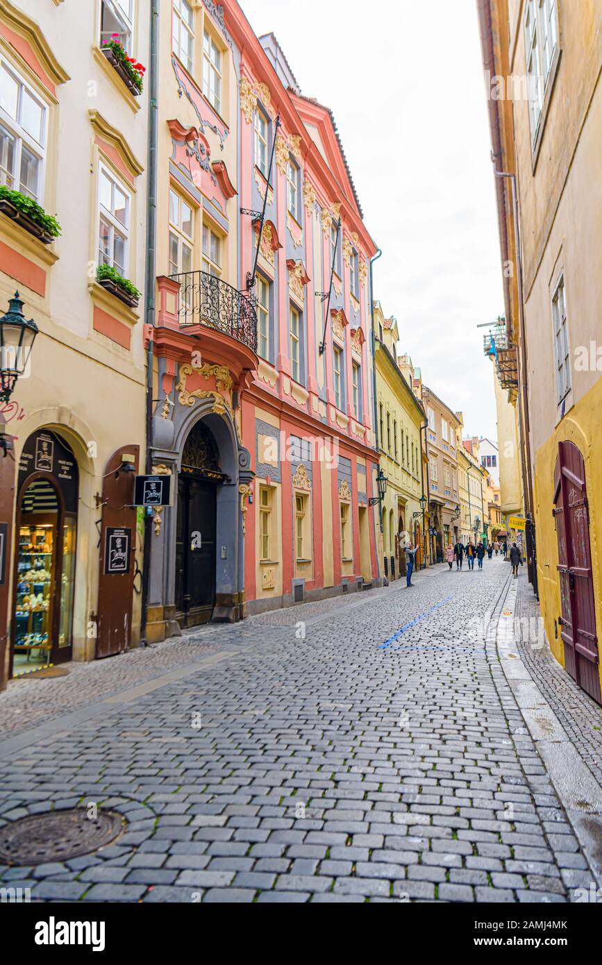 Traditional cobbled street with ornate buildings, Prague, Czech Republic Stock Photo