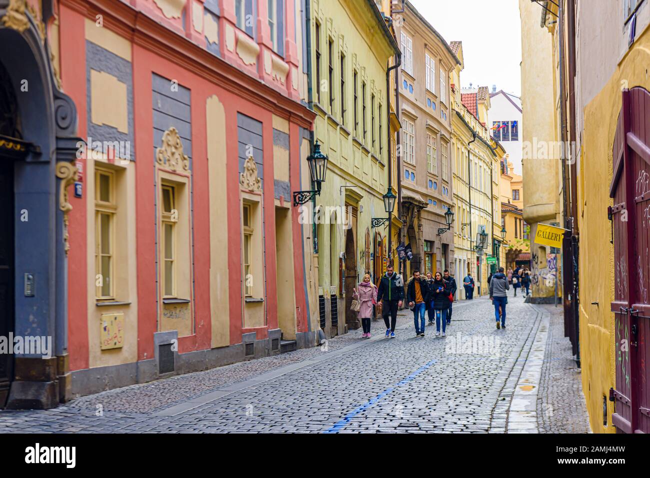 Traditional cobbled street with ornate buildings, Prague, Czech Republic Stock Photo
