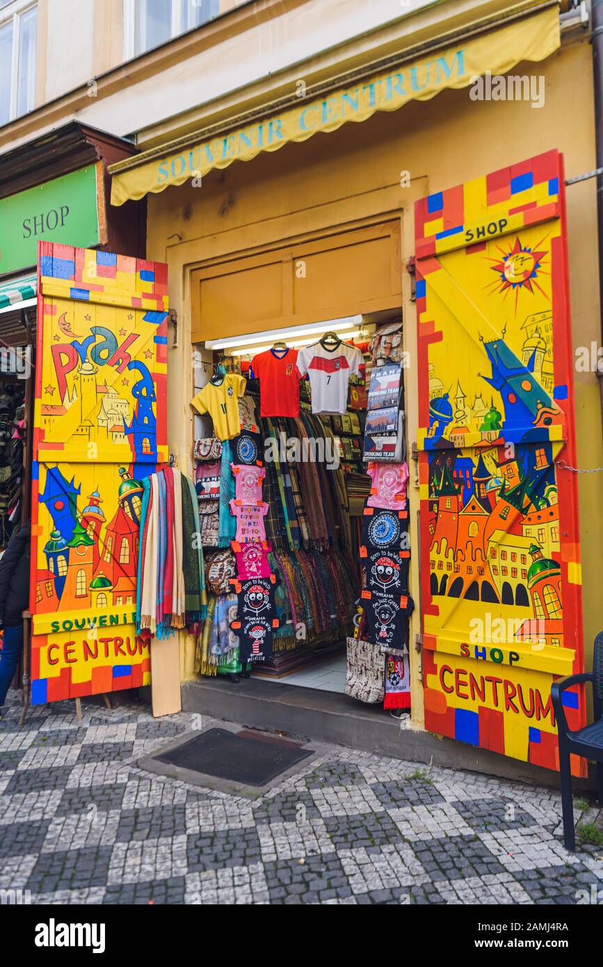 Souvenir shop with colourful wooden doors,  selling tee shirts and other souvenirs, Prague, Czech Republic Stock Photo
