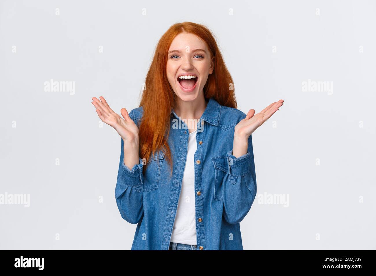 Cheerful, happy and optimistic alluring redhead teenage girl clap hands and laughing from amazement, having fun, watching funny stand-up comedy Stock Photo - Alamy