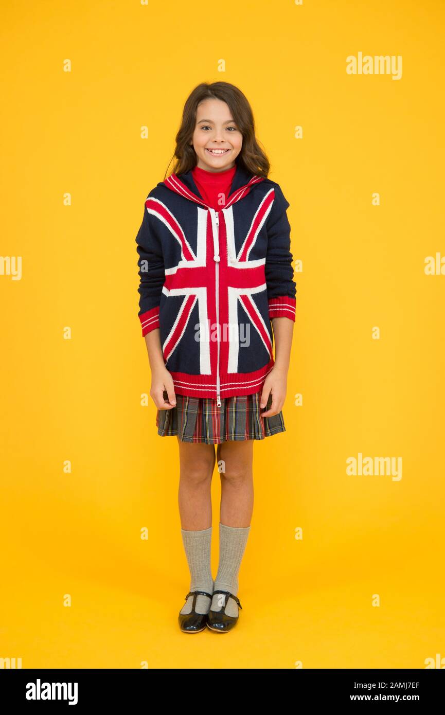 Culture and customs. Small girl school uniform. English student
