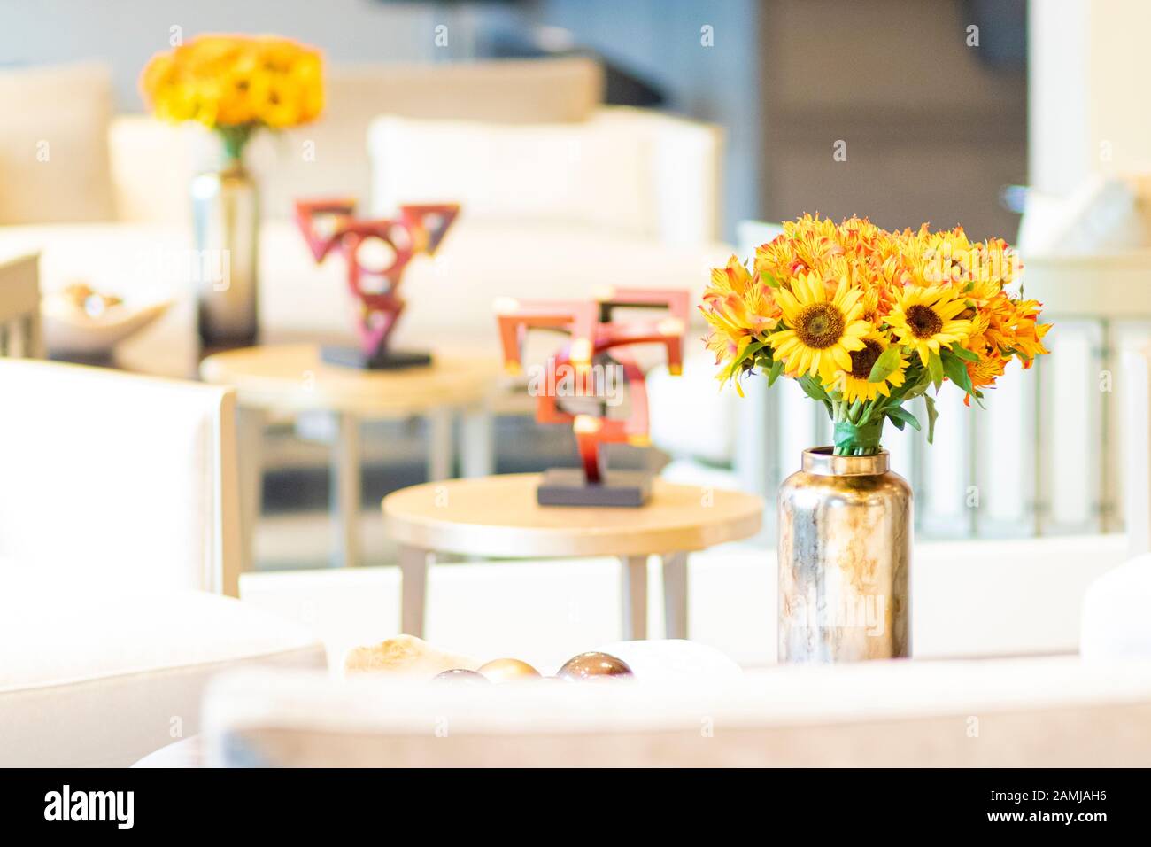 Floral Arrangement Of Sunflowers Decorating The Living Room Of The
