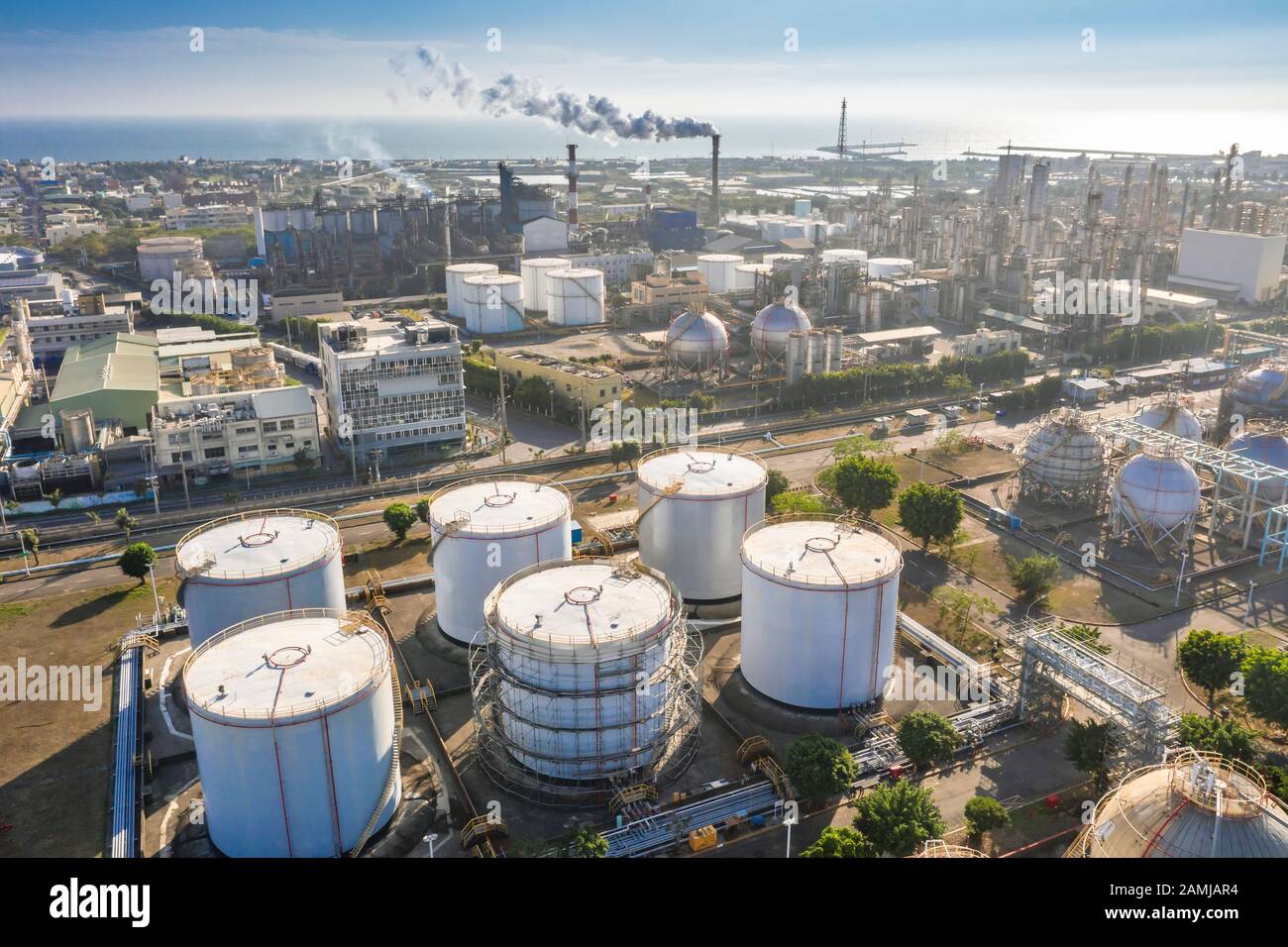 Aerial view of industrial area with chemical plant. Smoking chimney from factory Stock Photo