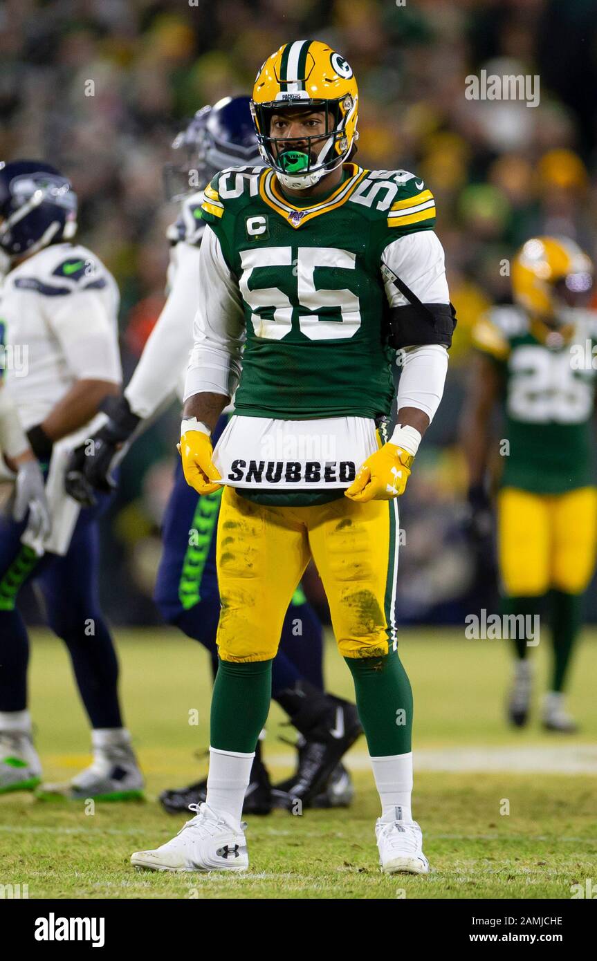 Green Bay, WI, USA. 12th Jan, 2020. Green Bay Packers outside linebacker  Za'Darius Smith #55 displays his undershirt after sacking Seattle Seahawks  quarterback Russell Wilson #3 during the NFL Football game between