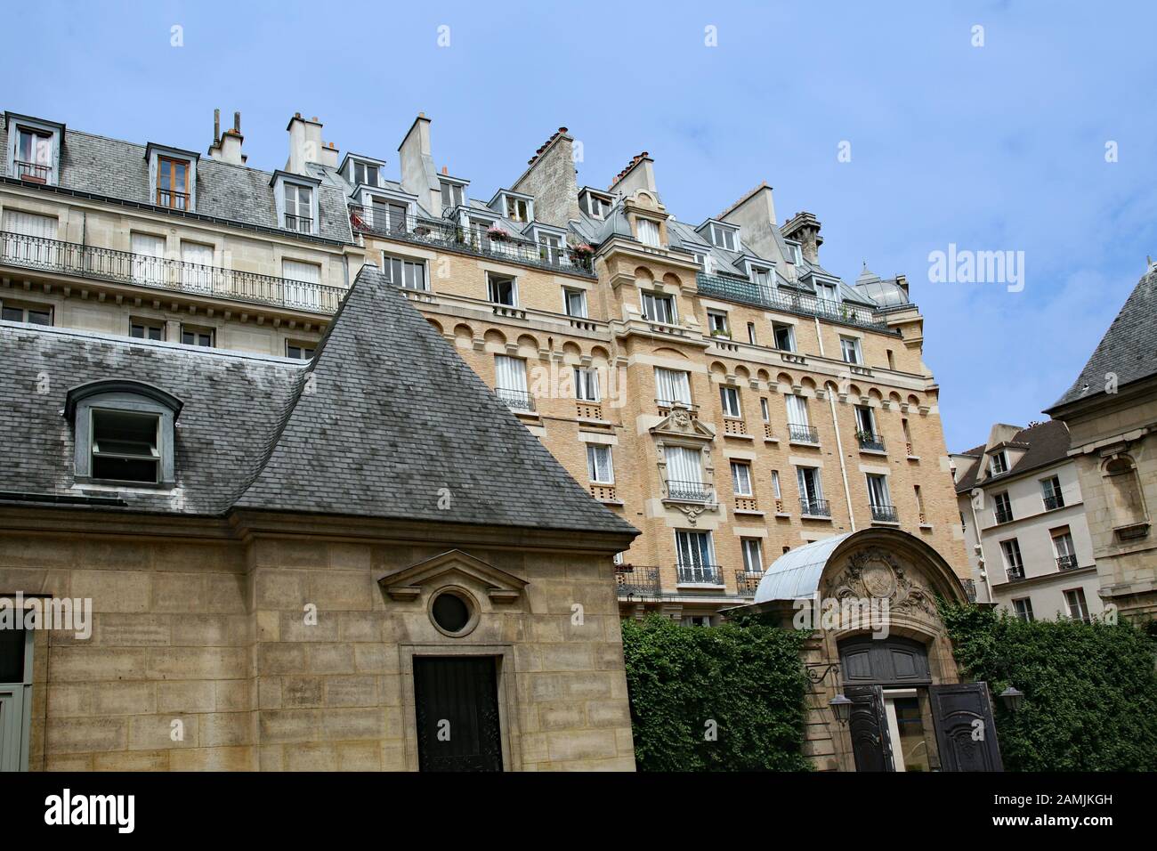 Paris, residential district with traditional apartment buildings with baroque style details and slate roofs Stock Photo