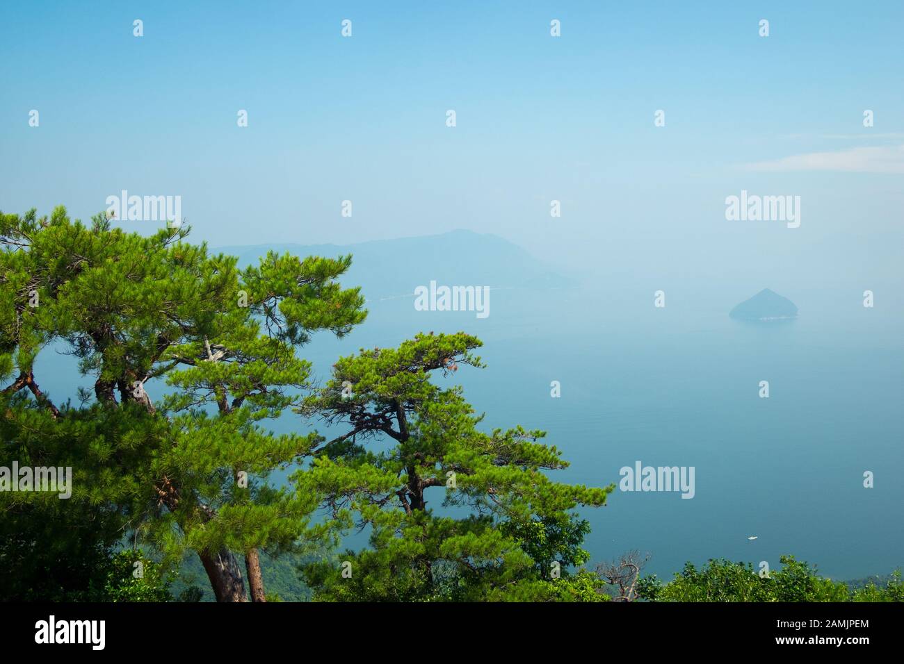 A view of Seto Inland Sea on a hazy summer day from the Shishiiwa Observatory on Mount Misen, Miyajima Island (Itsukushima), Japan. Stock Photo