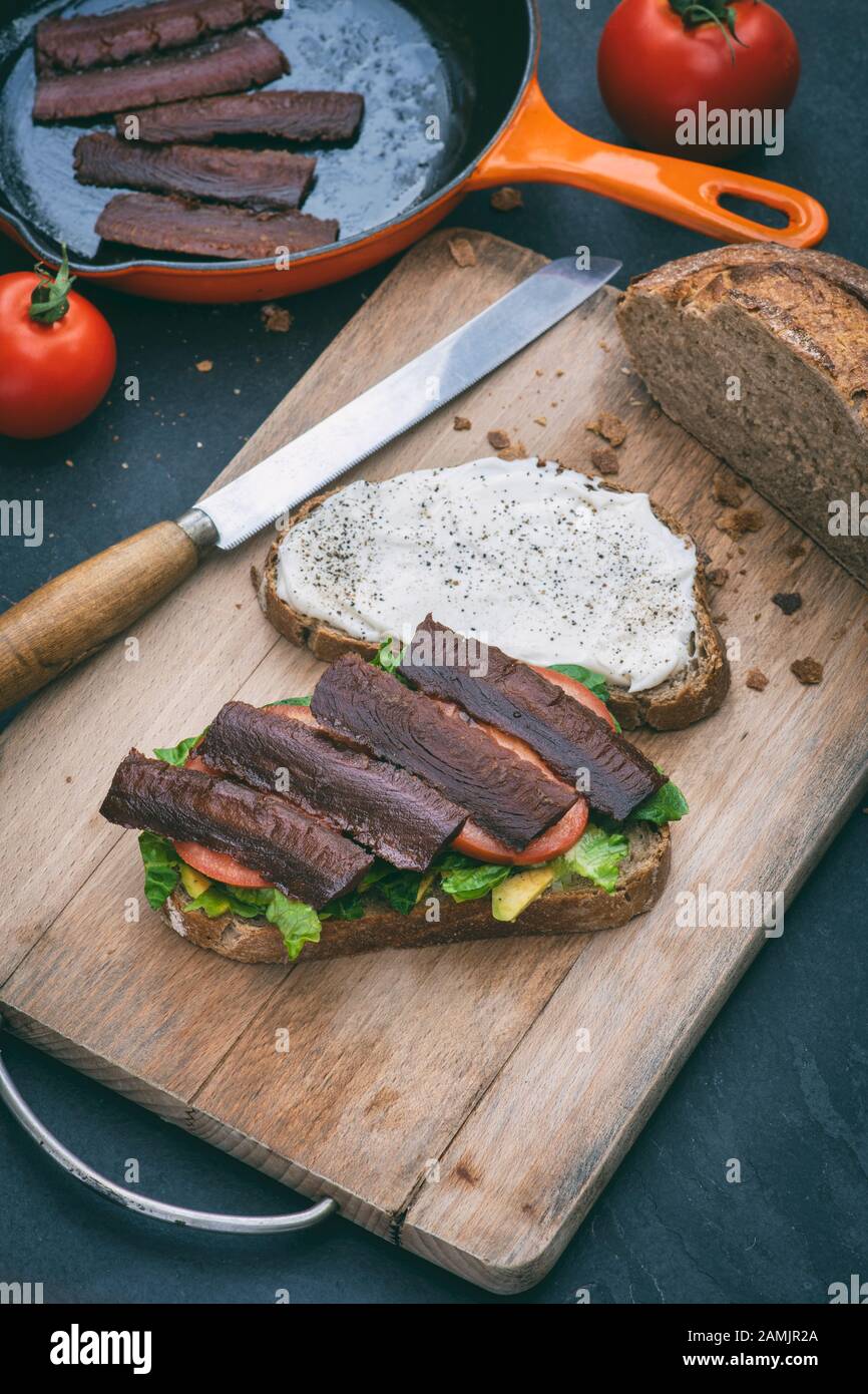 Vegan BLT sandwich with vegan mayonnaise and sourdough bread Stock Photo