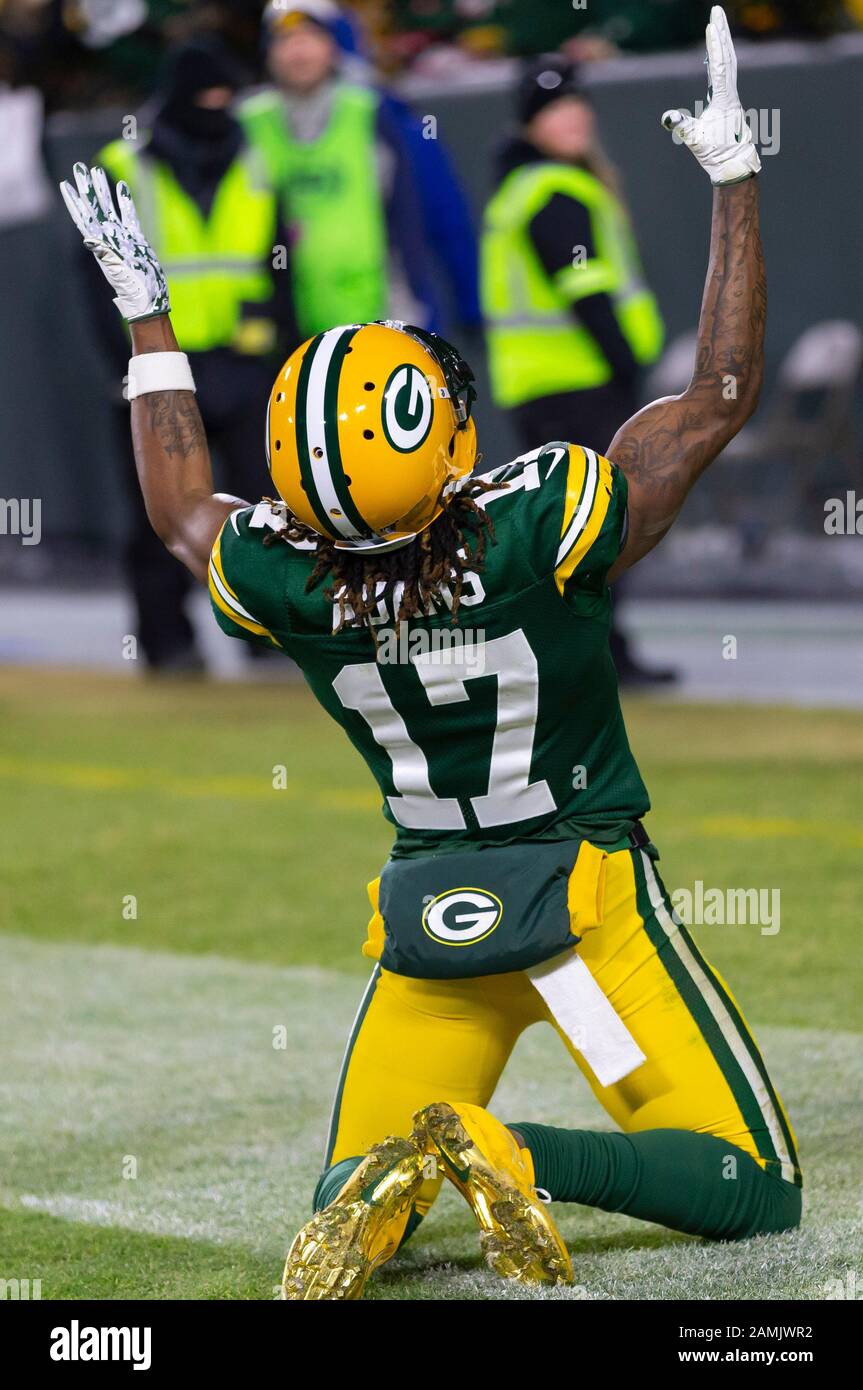 Green Bay, WI, USA. 12th Jan, 2020. Green Bay Packers wide receiver Davante  Adams #17 drops to his knees after scoring on a 40 yard touchdown pass  during the NFL Football game