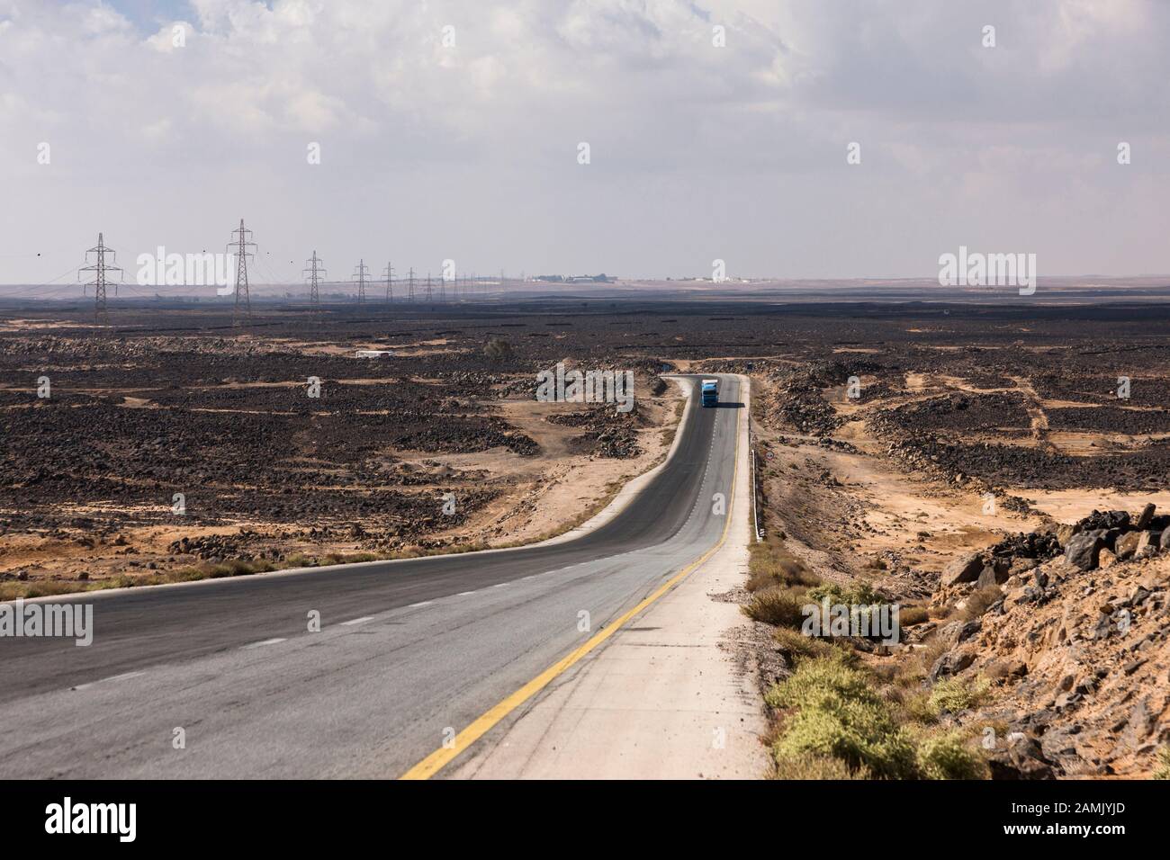 Desert Road, Desert highway, route 5, in basalt gravel desert, near Azraq, eastern desert, Jordan, middle east, Asia Stock Photo