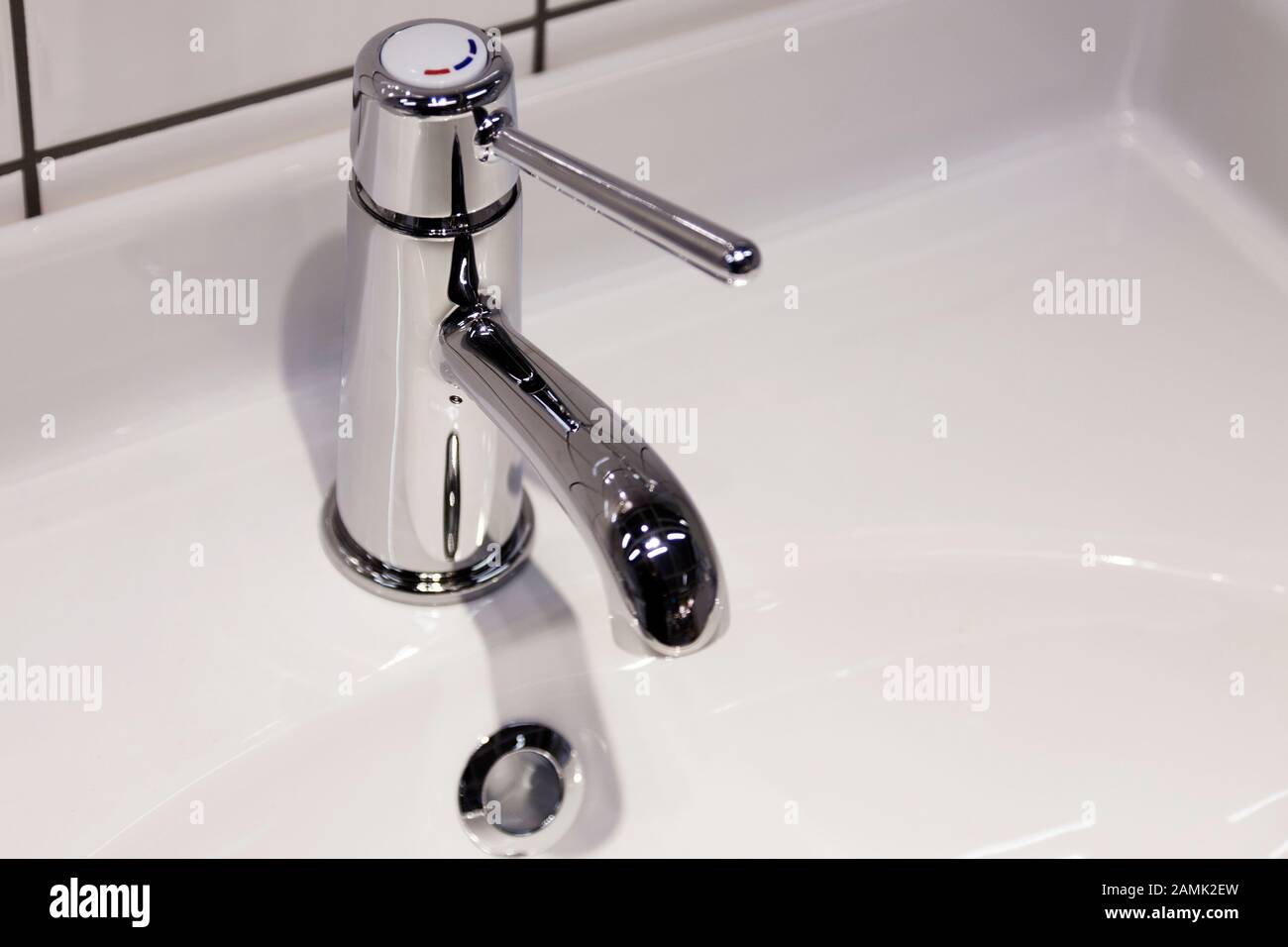 New Faucet In Bathroom With Parts Of Sink Stock Photo Alamy