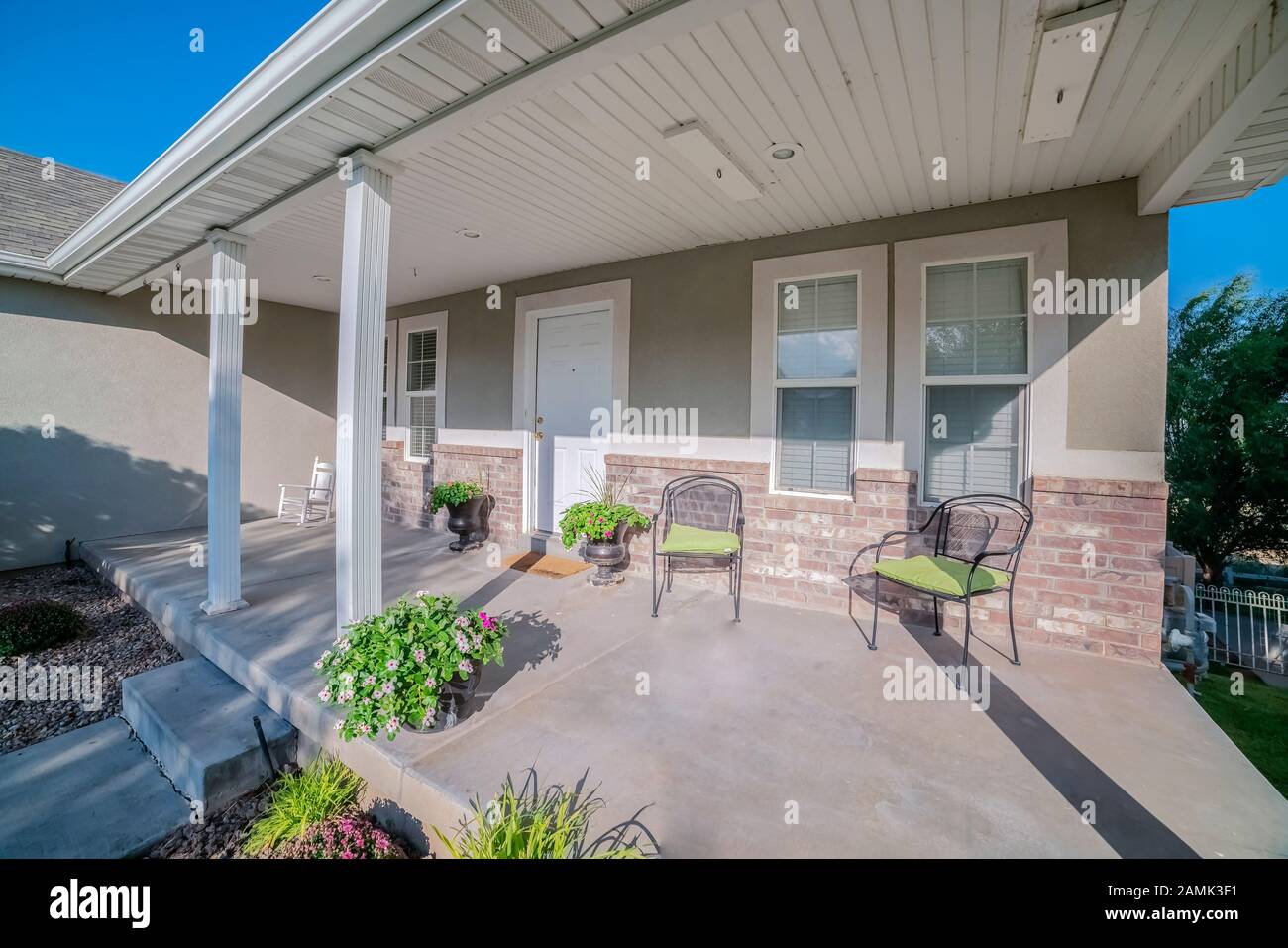 Covered porch at the front of an urban house Stock Photo - Alamy