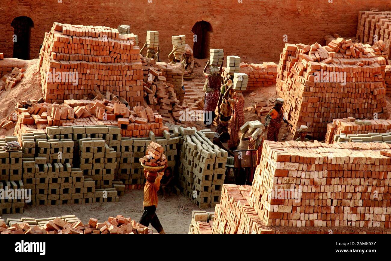 brick kiln pronunciation . brick kiln in bangladesh . All poor man & Women Are Work Hard In Bricks Factory For Food . Stock Photo