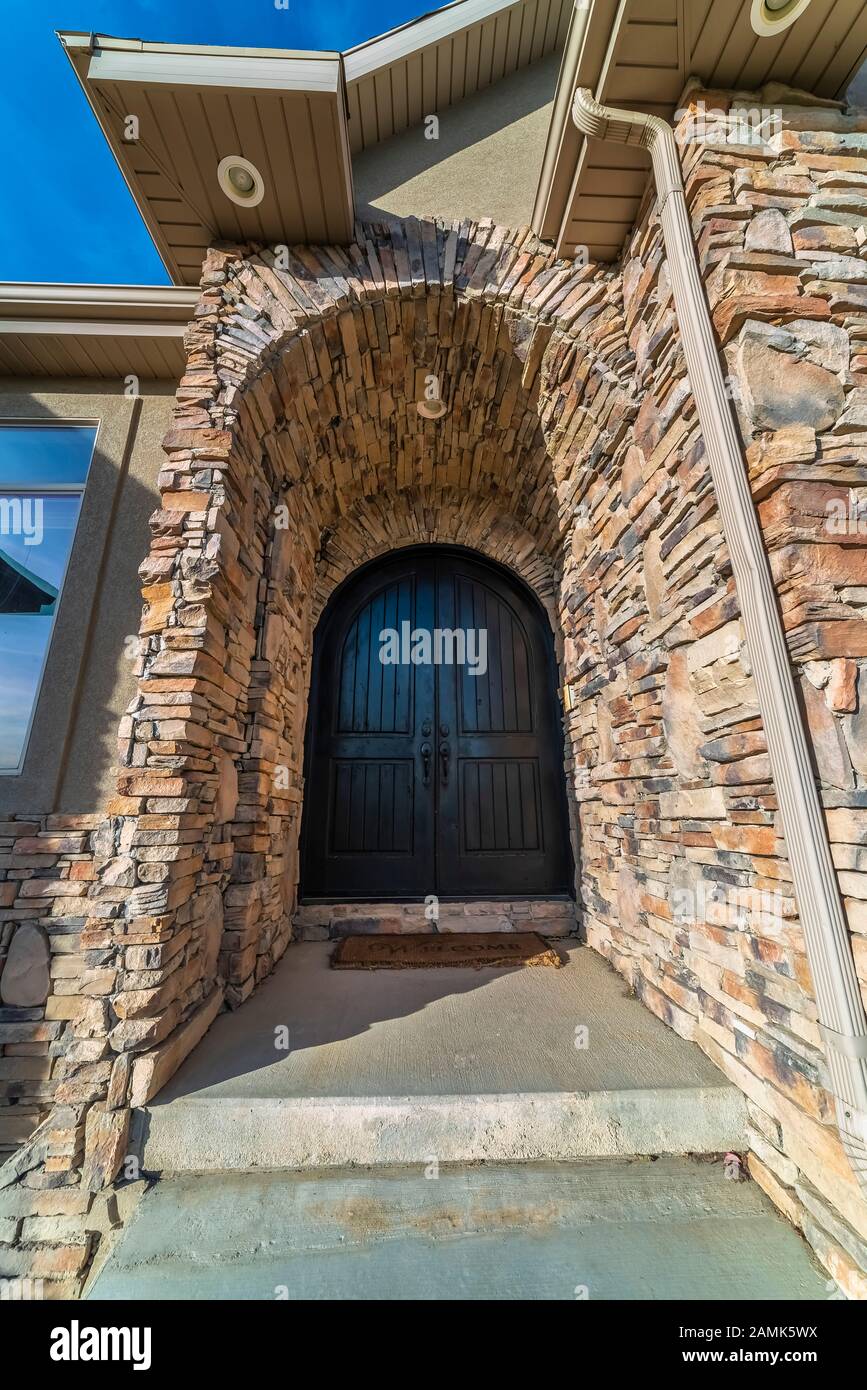 Arched door and entry passage to a house Stock Photo Alamy