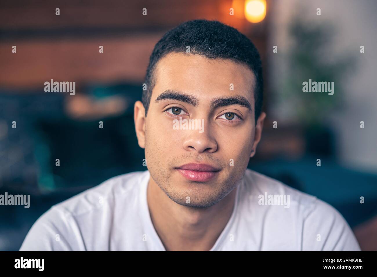 Young handsome guy looking in front of himself Stock Photo Alamy