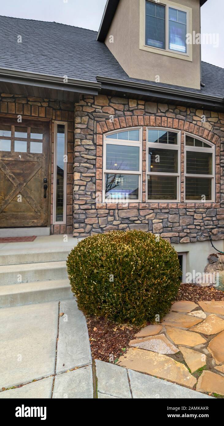 Vertical Modern house with crazy paving landscaping day light Stock ...