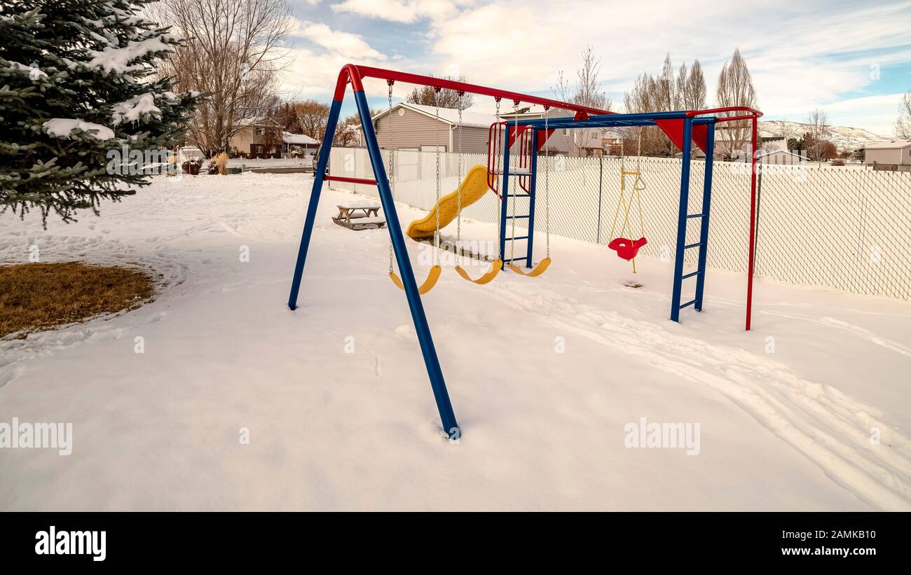 Panorama frame Kids playground in winter snow day light Stock Photo - Alamy