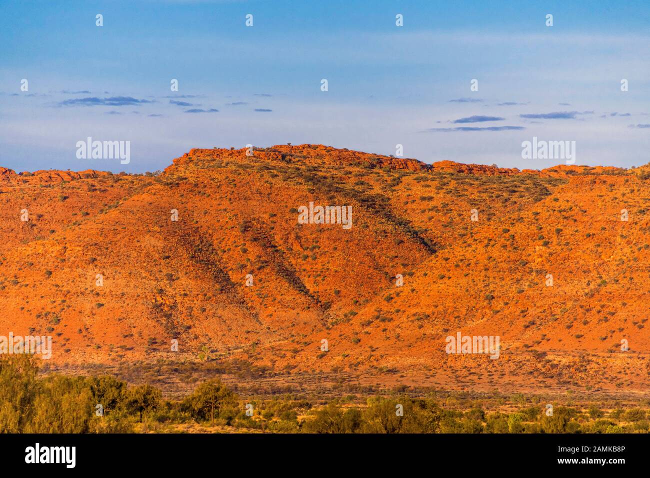 Sunset at Carmichael's Crag and the George Gill Range viewed from Kings Canyon Resort. Northern Territory, Australia Stock Photo